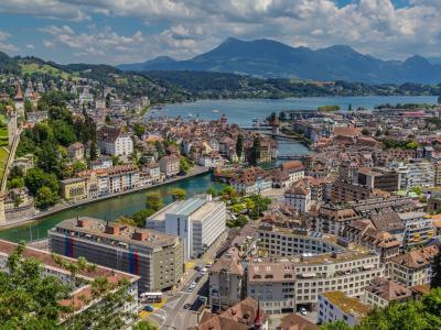 Stunning aerial view of Lucerne, showcasing its unique architecture along the lake and mountains.